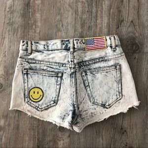 Trendy Denim shorts with patches and studs